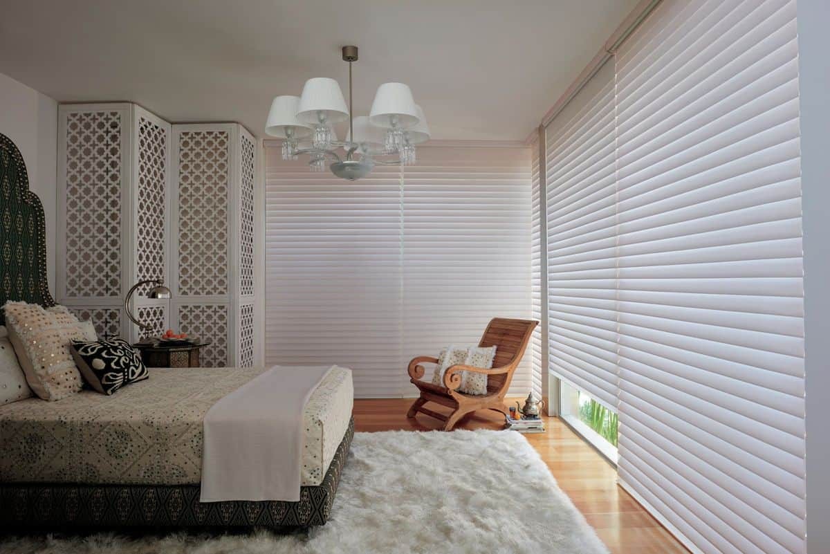 Hunter Douglas Silhouette® Sheer Shades blocking out light in the room of a home