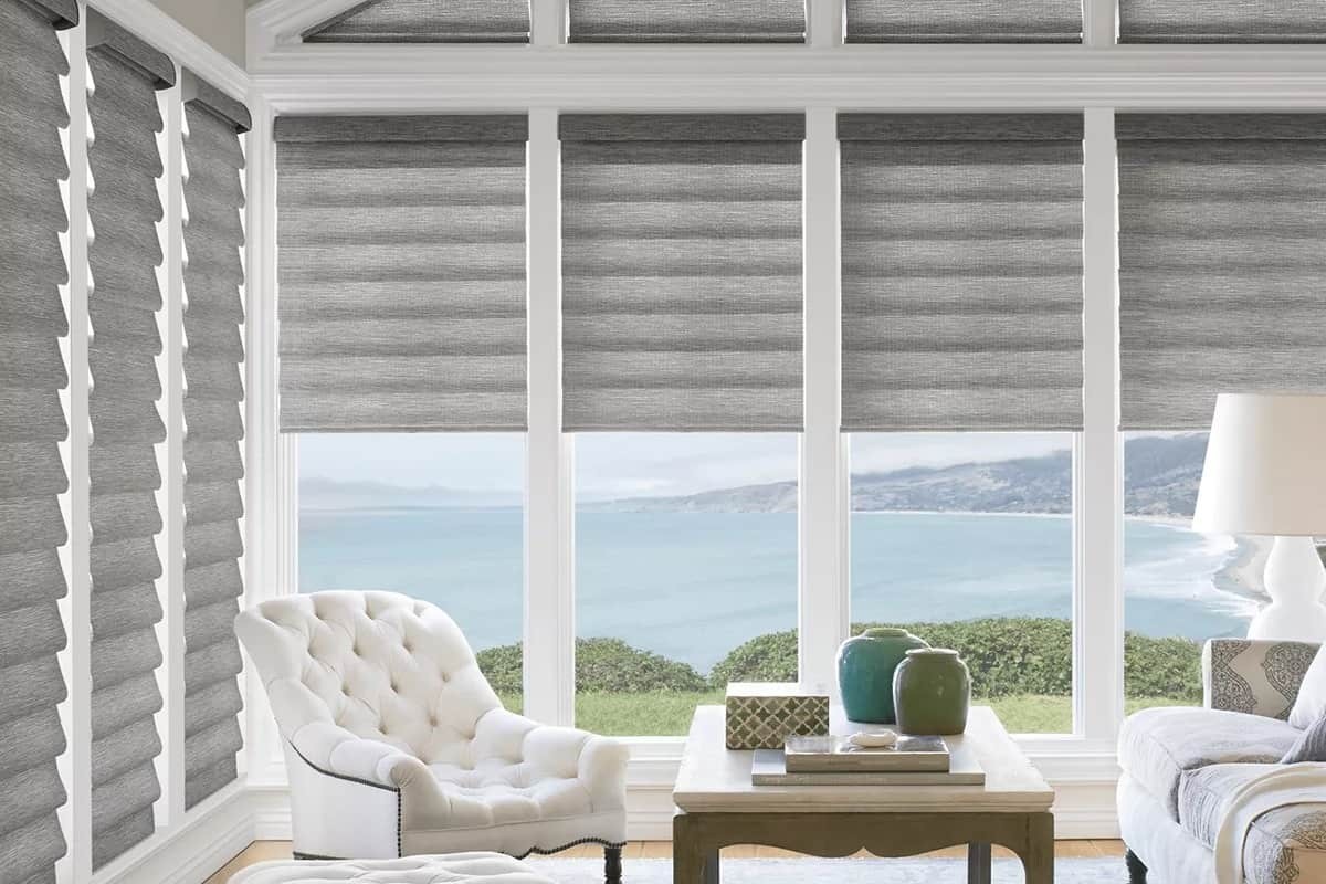 Vignette Roman shades from Hunter Douglas in a living room